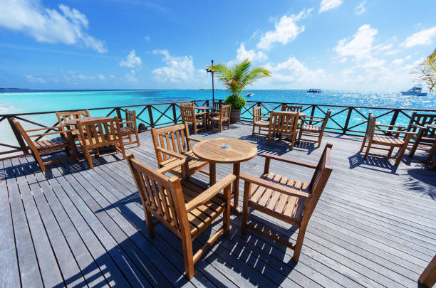 istock Restaurant Tables And Chairs On The Sea View Terrace 956703032