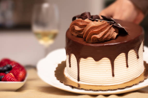 Chocoalate Ganache and Vanilla Cake decorated with Frosting and Chocolate Candy