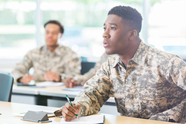 istock Young American soldier in college class 956729710