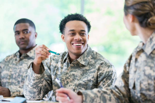istock Young male soldier in college class 956729726