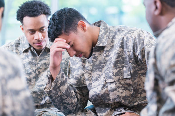 istock Upset soldier during counseling session 956729776