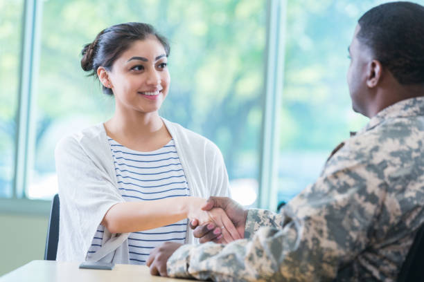 istock Recruitment officer greets new recruit 956729782