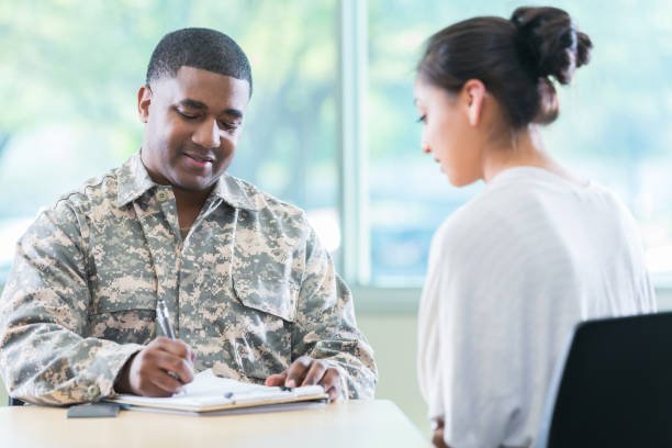 istock Army recruiter talks with new recruit 956729798