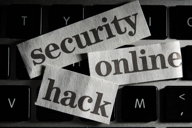 istock Online Security Concept with cut out words from newspaper 956729994