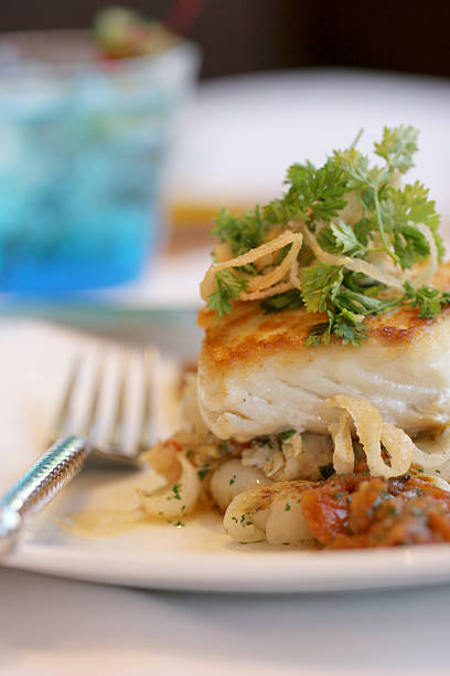 Sea Bass on Roasted Vegetables stock photo