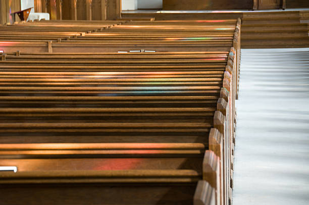 istock Rows of Pews with Stained Glass Light 95673246