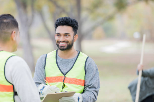 istock Excited young male volunteer coordinator in conversation 956732810