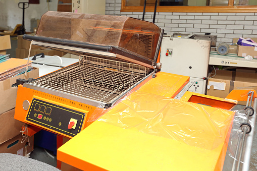 Vacuum Packaging Machine in Printing Factory