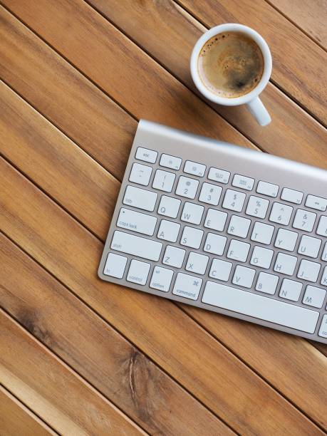 istock Wooden board with white keyboard 956739314