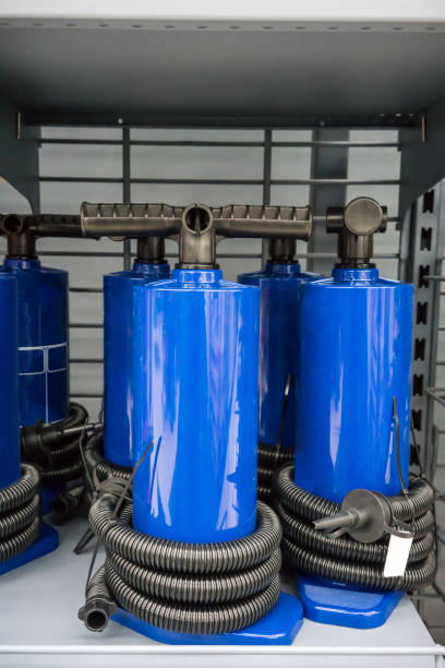 istock Portable hand push pump with big blue tank and small black tip 956750998