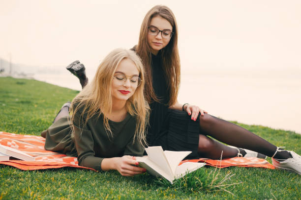 istock girls in a park 956757022