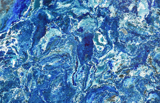 Blue marble patterned background for design.