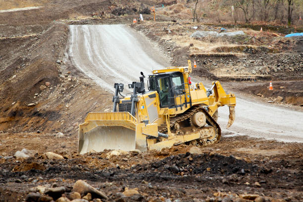 istock Large bulldozer with the long claw-like device on the back 956764736