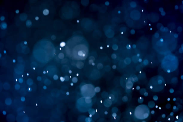 istock Christmas blur bokeh background texture abstract light glittering stars on bokeh. glitter vintage lights background 956769742