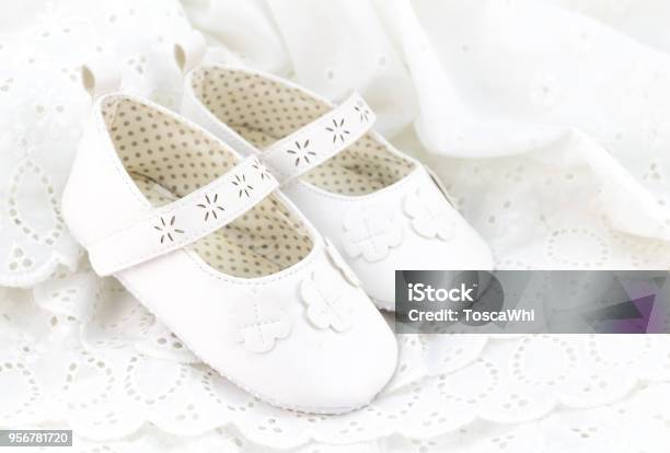 Baby White Baptism Or Birthday Dress And Shoes Close Up With Space For Text Stock Photo - Download Image Now