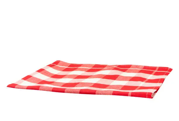 Empty tablecloth red white checkered isolated on white background. For your food and product display montage. Concept food.