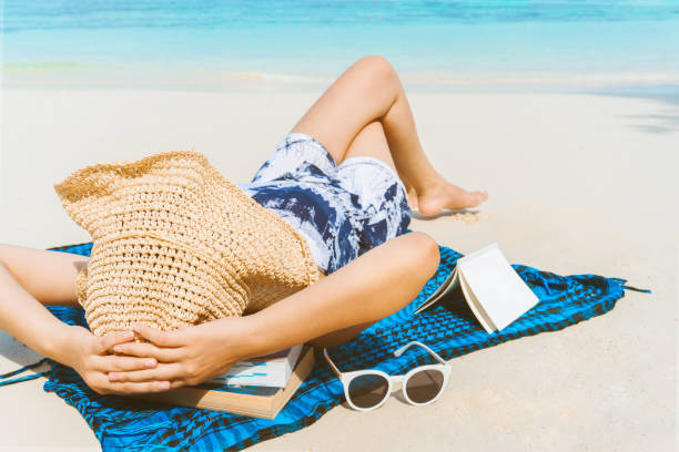 istock Asian women relaxing in summer holiday on beach 956782930