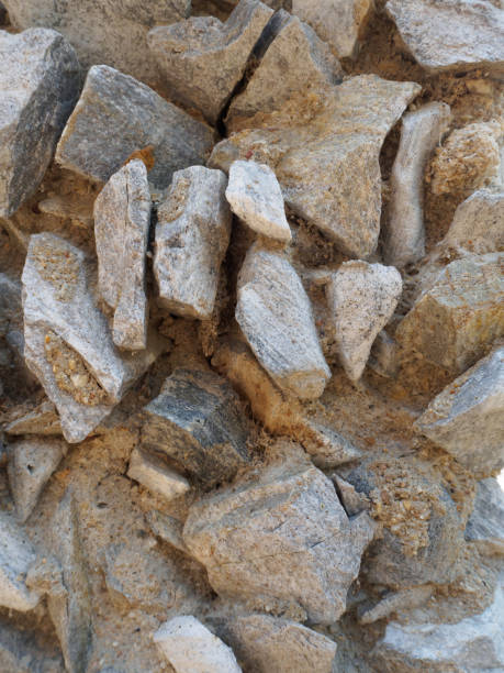 istock Modern Style Design Decorative Uneven Cracked Real Stone Wall Surface 956785618