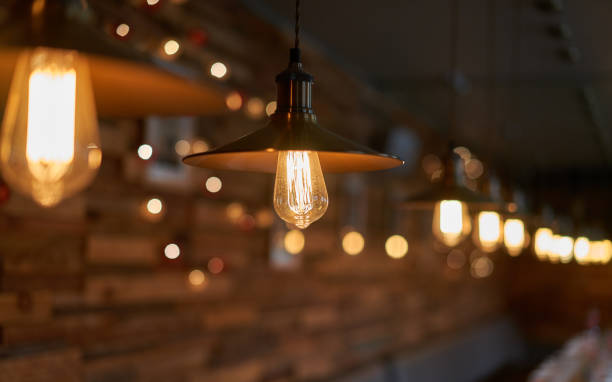istock beautiful light bulbs in a dark interior 956787360