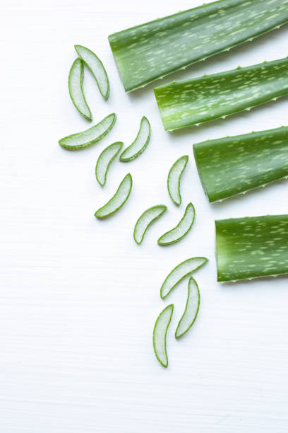 istock Aloe Vera sliced and leaf isolated. 956788438