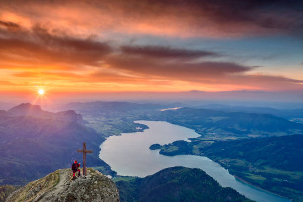 istock Mountain Climber enjoy the sunset at Mount Schafberg, 956796586