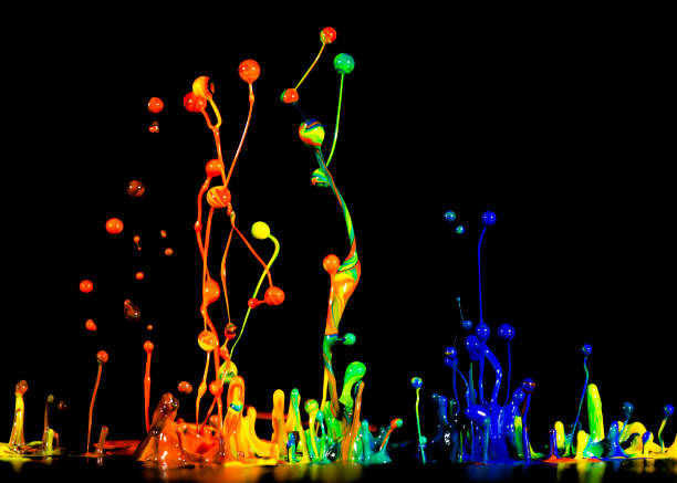 istock splash of acrylic paint, abstract background on black 956807492