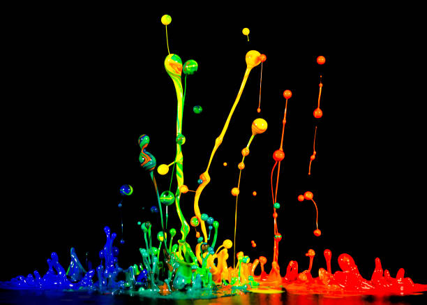 istock splash of acrylic paint, abstract background on black 956807668