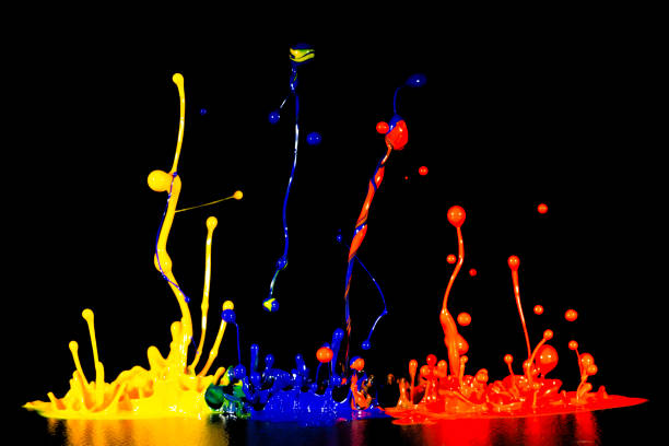 istock splash of acrylic paint, abstract background on black 956807862