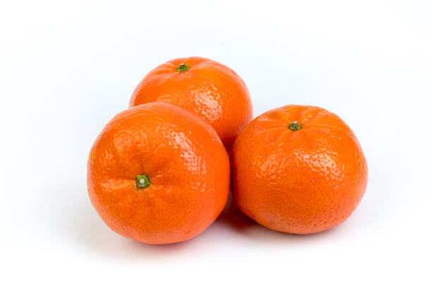istock Ripe orange fresh mandarin, mandarin slices, isolated on white background 956808002