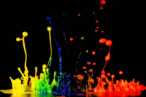istock splash of acrylic paint, abstract background on black 956808042