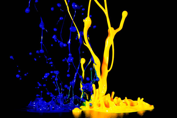 istock splash of acrylic paint, abstract background on black 956808310
