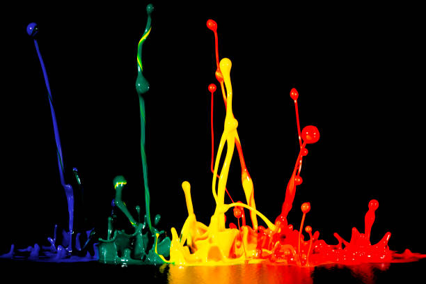 istock splash of acrylic paint, colored abstract background on black 956808458