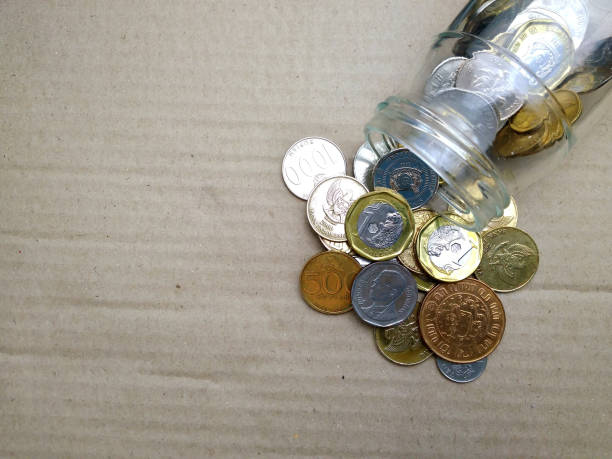 istock top view or flat lays, spill golden coin from jar 956808814