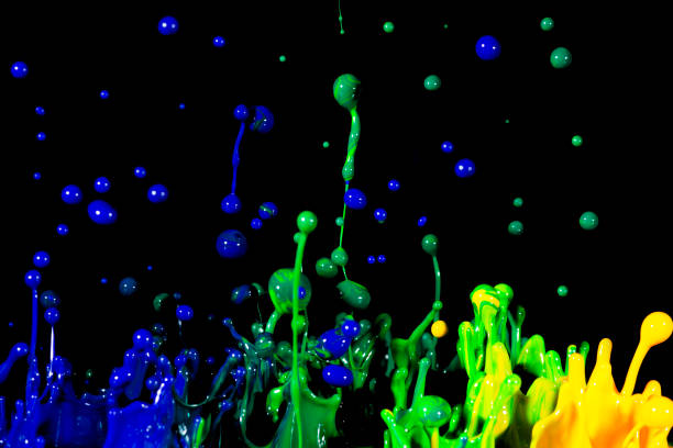 istock splash of acrylic paint, colored abstract background on black 956810112