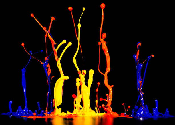 istock splash of acrylic paint, abstract background on black 956812634