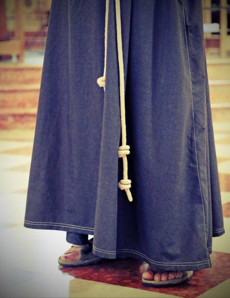 istock monk with sandals in the church with vintage effect 956814052