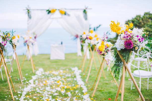 istock Romantic wedding ceremony on the lawn Sea view. 956814752