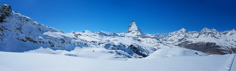 Panoramic beautiful view of snow mountain Matterhorn peak, Zermatt, Switzerland.Panoramic beautiful view of snow mountain Matterhorn peak, Zermatt, Switzerland.