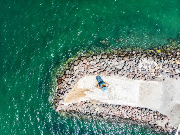 istock Aerial View of Seaside With Lighthouse 956818492