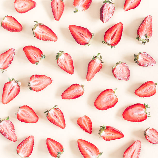 istock Strawberry pattern on pastel yellow background. Flat lay, top view 956818592