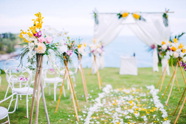 istock Romantic wedding ceremony on the lawn Sea view. 956820260