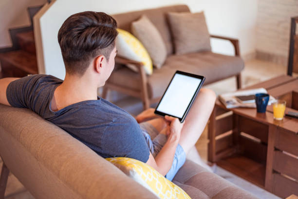 istock Young Asian man at home 956820556
