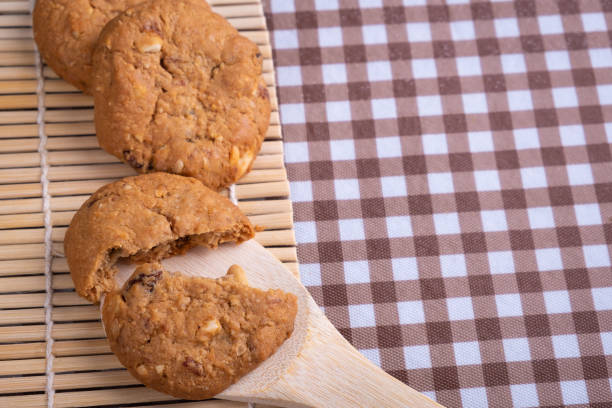 istock cookie grains on bamboo wooden spoon 956826674