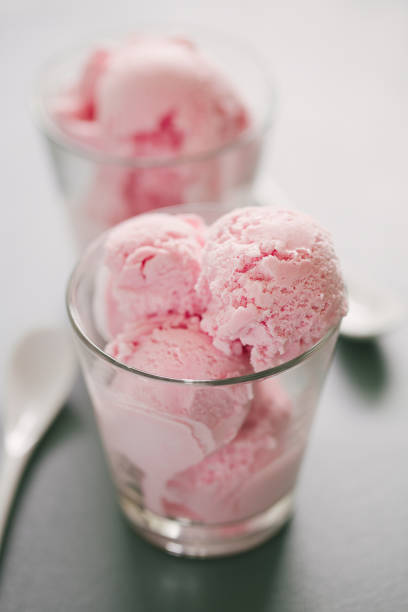 istock Strawberry ice cream scoops in glass 956829074