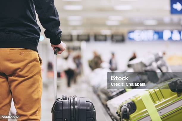 Man In Airport Terminal Stock Photo - Download Image Now - Airport, Baggage Claim, Organization