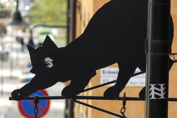 Stockholm, Sweden May 7, 2018 A sign formed like a black cat. Sodermalm, Mariatorget