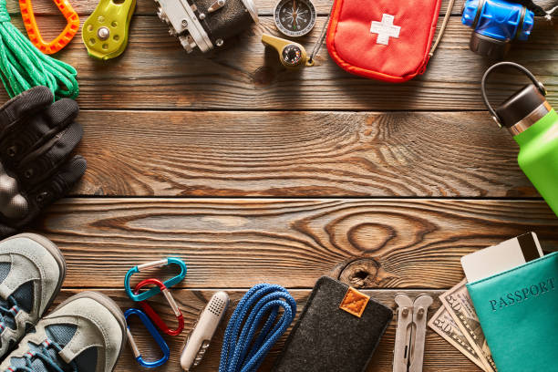 istock Travel items for hiking over wooden background 956835534