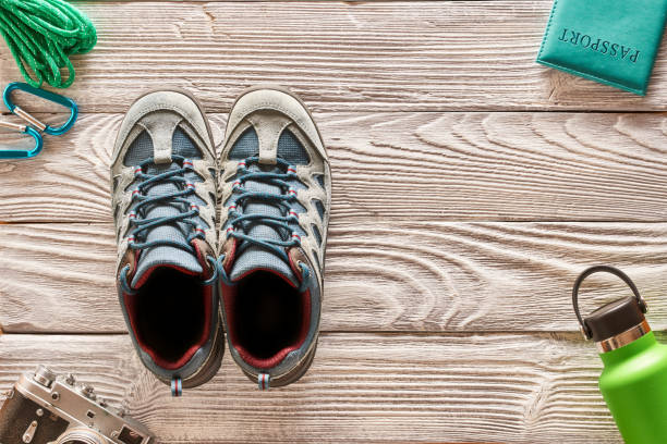 istock Travel items for hiking over wooden background 956835538