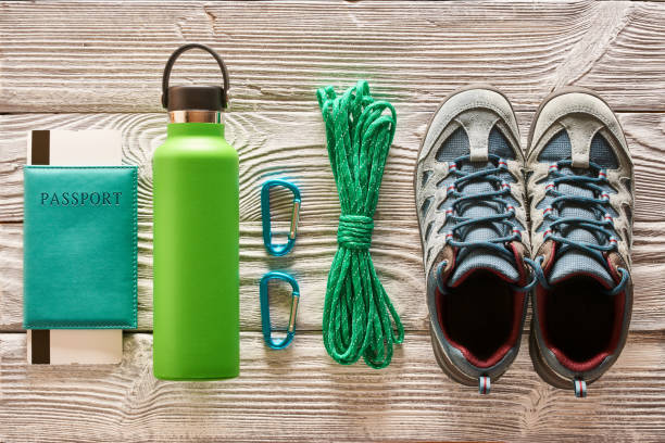 istock Travel items for hiking flat lay 956835594