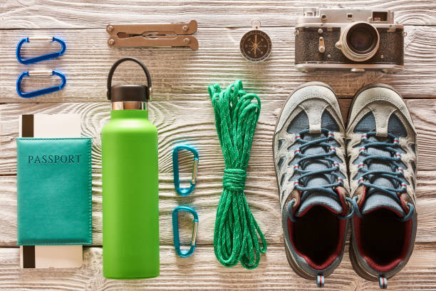 istock Travel items for hiking flat lay 956835602